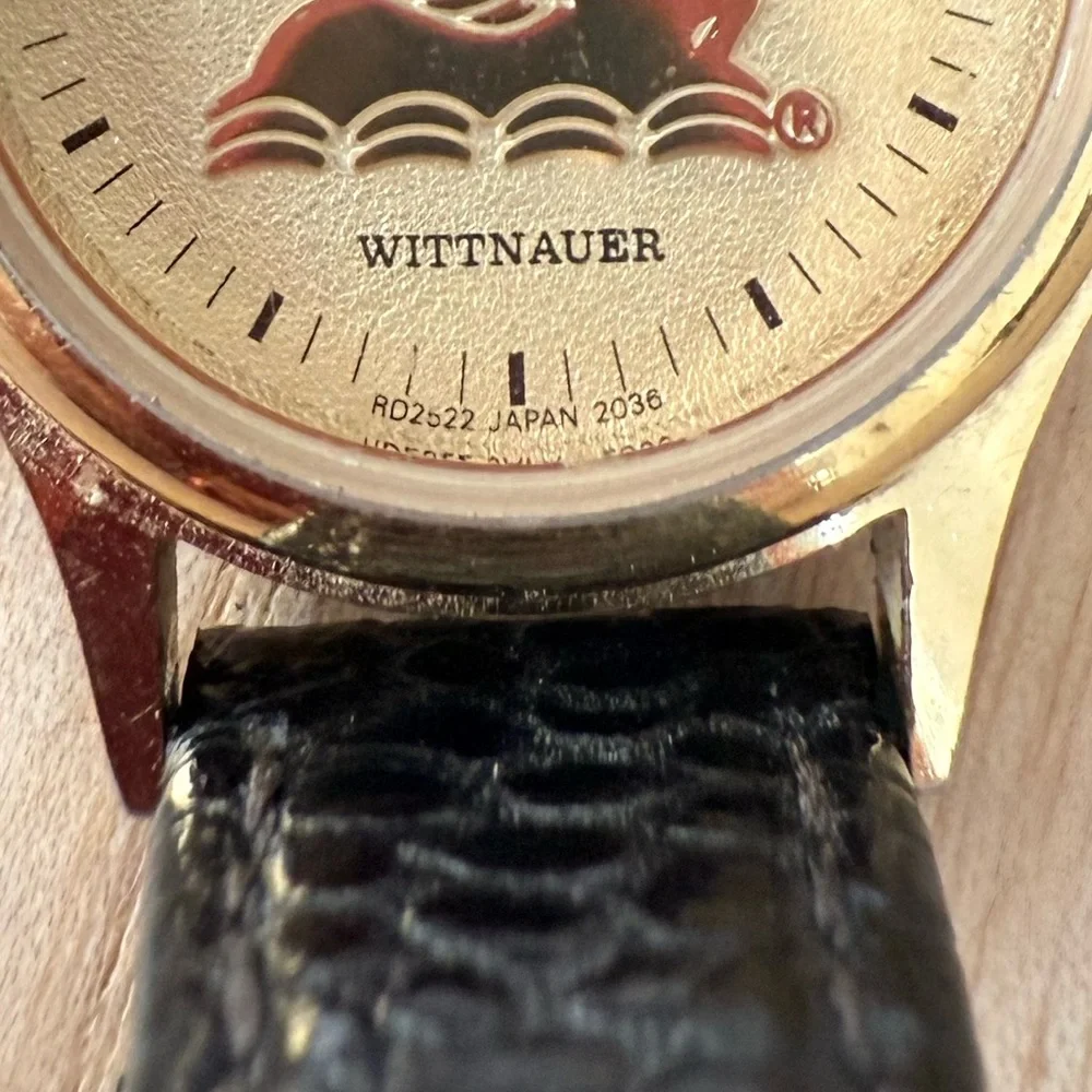 Wittnauer ladies gold tone Pegasus black leather watch NEW BATTERY